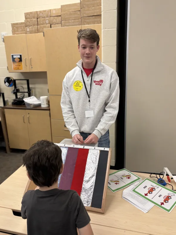Alex leads an activity